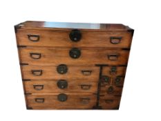 A Japanese tansu chest, width 114cm, depth 140cm, height 100cm