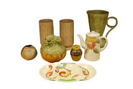 Eight pieces of 1930's china and pottery to include a Royal Doulton dish, Beswick jug and a studio