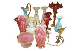 A collection of Victorian and later coloured glassware, holders and glass vases to include a
