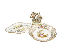 A Ludwigsburg style porcelain group, a reticulated Dresden porcelain dish and a Dresden lobed