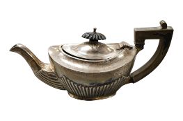 A late Victorian demi-fluted oval silver bachelors teapot, by Jones & Crompton, Chester, 1899, gross