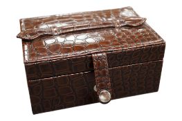 A collection of jewels, including a cased gold and 0.05 carat cushion-shaped diamond stick pin,