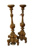 A pair of large 18th century style plaster alter candlesticks, 78cm high