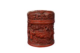 A 19th century Chinese cinnabar lacquer pot and cover, 9 cm high.
