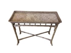 A narrow faux bamboo and rattan tray top table, width 86cm, depth 35cm, height 74cm