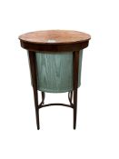 A George III mahogany oval work table, width 47cm, depth 34cm, height 74cm