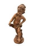 A moulded composition figure of a youth, after A. Moreau, in a terracotta finish, 70cm high.