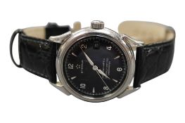 A gentleman's stainless steel Eterna Eterna-matic wrist watch, with black dial, Arabic and baton
