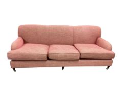 Lawson Wood. A pale orange fabric upholstered three seater sofa, width 230cm, depth 90cm, height
