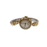 A lady's 9ct gold Rolex Precision manual wind wrist watch, with Arabic dial and subsidiary seconds a