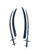 Two 19th century Indian sword tulwars, iron hilts of conventional form, in their leather covered