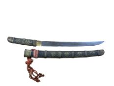 A Japanese tanto in its scabbard, the blade 30cm