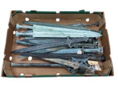 A collection of sixteen assorted Chinese bronze foundation weapons, including four pairs of items,