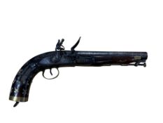 A 22 bore East India company style Indian Flintlock holster pistol with brass mounts, lock struck
