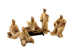 Liu Miao Chan (Taiwan 1946-2022) five leather sculptures of sages all on wood plinth bases,