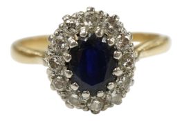 A late 20th century 18ct gold, sapphire and diamond set oval cluster ring, size Q, gross weight 4.