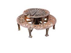 A late 19th century cast iron circular two tier plant stand, (in need of restoration), diameter