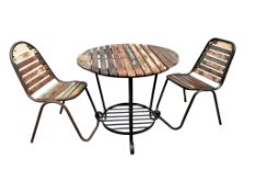 A circular slatted wood wrought iron garden table, diameter 85cm, height 76cm together with two