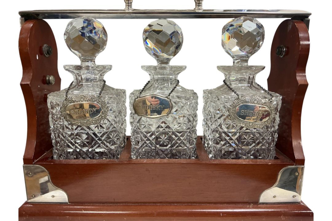 A mahogany and silver-plated tantalus, with three cut glass square decanters and stoppers, - Image 2 of 3
