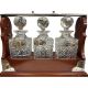 A mahogany and silver-plated tantalus, with three cut glass square decanters and stoppers, - Image 2 of 3