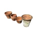 Four terracotta pots, largest diameter 43cm, height 47cm