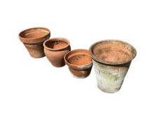 Four terracotta pots, largest diameter 43cm, height 47cm