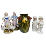 A late Victorian Torquay Ware pottery bulb vase, height 20cm, and two pairs of Continental porcelain