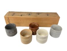 A Fujie Miyama Sakeware Set, comprising five pottery sake cups, guinomi, all with potter's seal