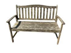 A teak garden bench (a.f. ornamental purposes only), width 125cm, depth 55cm, height 83cm