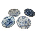 Three mid 18th century English delftware blue and white plates, the largest each painted with a deer