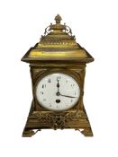 A French brass clock, height 30cm.