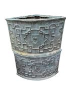 A group of planters comprising two corner lead planters (probably fibre glass), two tapered