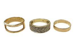 A 14k small band, size I, a 14ct gold and diamond chip cluster set ring and one other yellow metal