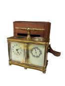 A cased Victorian carriage clock and barometer, 15cm high.