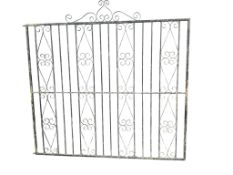 Two painted wrought iron garden gates, larger width 210cm, height 226cm