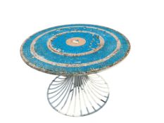 A painted circular wrought iron garden table with mosaic tiled top, diameter 124cm, height 78cm (top