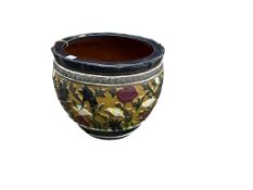 A large polychrome glazed circular garden planter, diameter 58cm, height 52cm