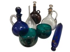 Three 19th century glass decanters along with a Bristol blue rolling pin, two finger bowls and a