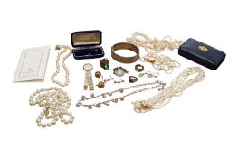 A freshwater pearl necklace, a cultured pearl bracelet with 14k clasp, three other necklaces, a