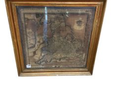 An early 19th century embroidered map of England and Wales, on silk, framed, damaged, 60 x 60cm