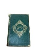 A Victorian scrap album of watercolour sketches to include a heraldic crest, portrait studies and