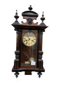 A late 19th century German eight day wall clock, width 32cm, depth 17cm, height approx. 65cm