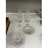 Six Webb flower and shell pattern engraved rock crystal champagne coupes and six side plates. (12)