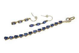 A pair of recent 9ct and three stone oval cut sapphire set drop earrings, overall approx. 40mm,