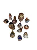 A collection of Royal Crown Derby paperweights, comprising two owls, a cockerel, a pig, various