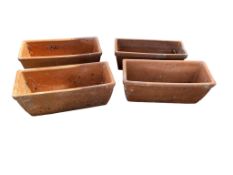 Four rectangular terracotta planters, width 43cm, depth 19cm, height 17cm