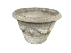 A large circular reconstituted stone garden planter, diameter 78cm, height 54cm