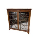 An early 20th century mahogany astragal glazed two door bookcase, width 122cm, depth 35cm, height