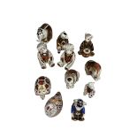 A collection of Royal Crown Derby paperweights, comprising teddy bears, a tortoise, a hen, a