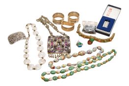 A small collection of assorted costume jewellery and silver, including three napkin rings, an